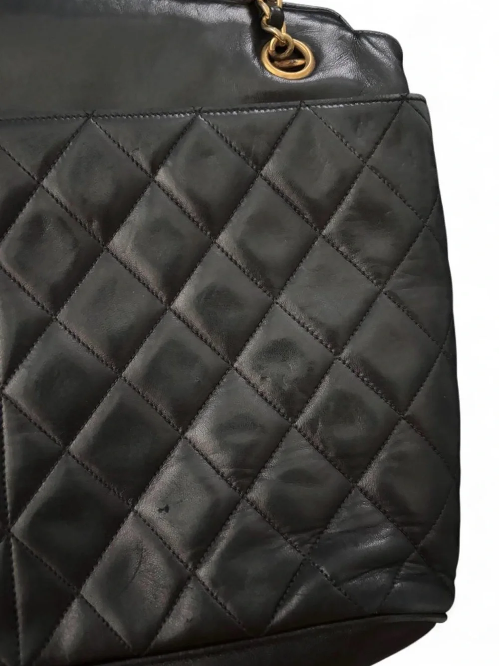 CHANEL Black Quilted Lambskin Leather Purse with Gold Hardware